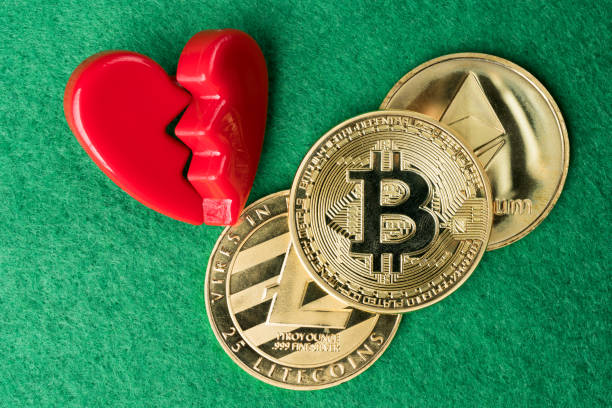 image of heart and crypto coins on a green background